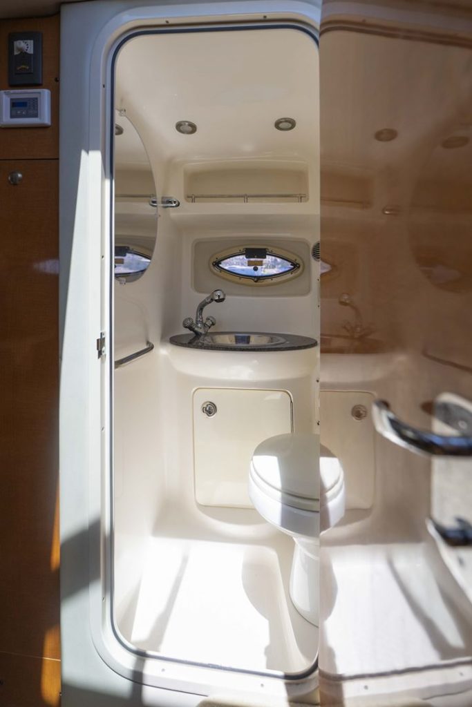 The bathroom of our Chaparral 250 Signature motor yacht